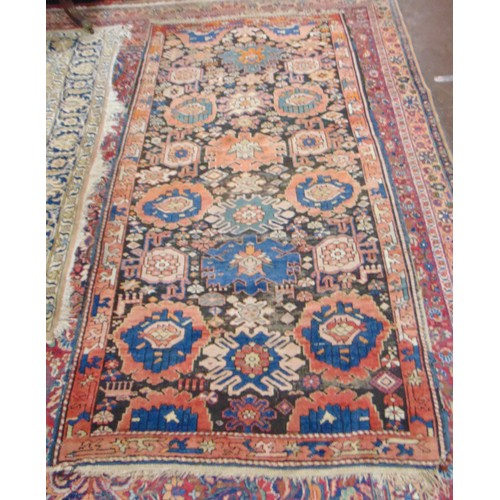 372 - Persian red and blue ground rug, having geometric pattern, 102 x 47