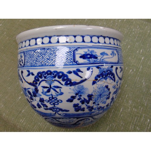 212 - Antique oriental blue and white jardiniere, having flowering branch decoration, 8