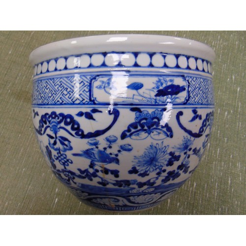 212 - Antique oriental blue and white jardiniere, having flowering branch decoration, 8