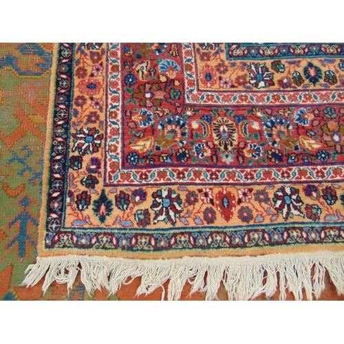 21 - Persian blue, red and pink ground rug,  having geometric floral pattern, 150 x 107