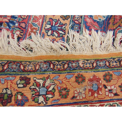 21 - Persian blue, red and pink ground rug,  having geometric floral pattern, 150 x 107