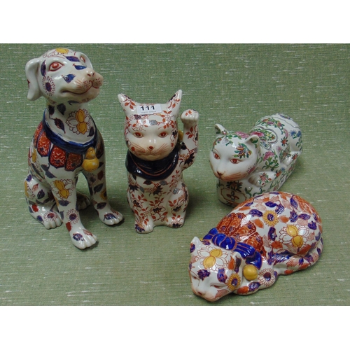 111 - Two Imari style pottery cats, dog and one other cat.