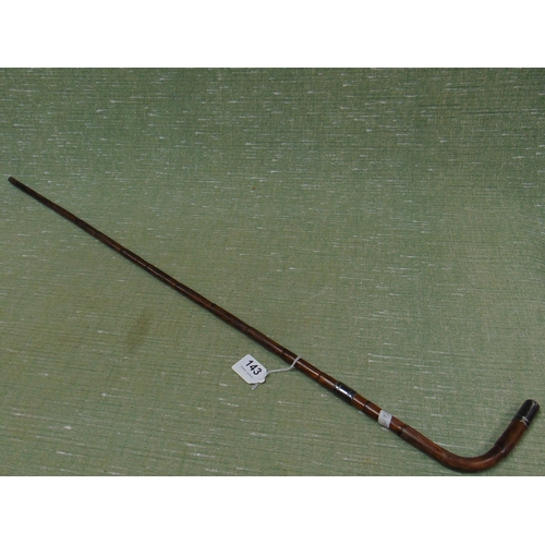 143 - Malacca silver mounted walking cane.