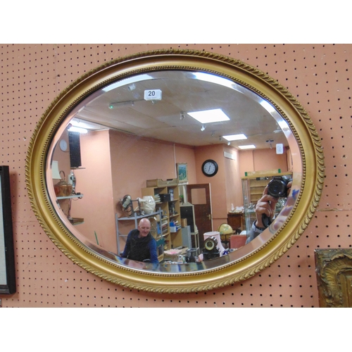 20 - An oval gilt framed bevel edged  wall mirror, 26