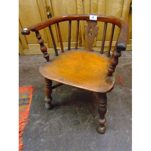 4 - Antique yew childs chair, having pierced splat back, spindles, solid seat, on turned supports joined... 