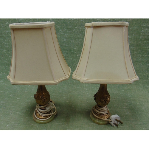 137 - Pair of ornate table lamps and shades.