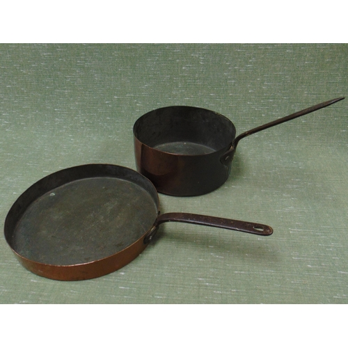 140 - Antique copper saucepan and a frying pan. (2)