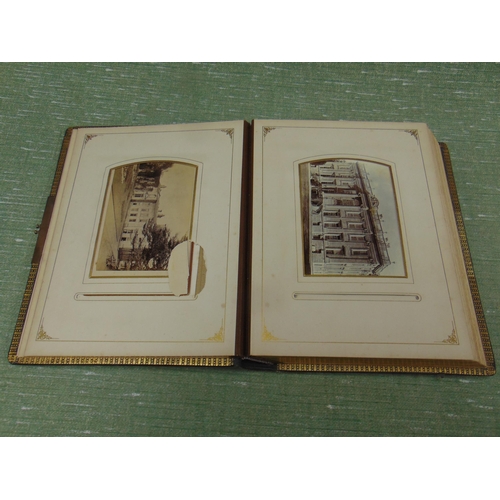 143 - Victorian photograph album and contents.