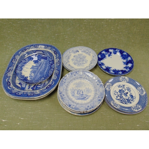 150 - Two antique willow pattern meat plates, and some blue and white plates.