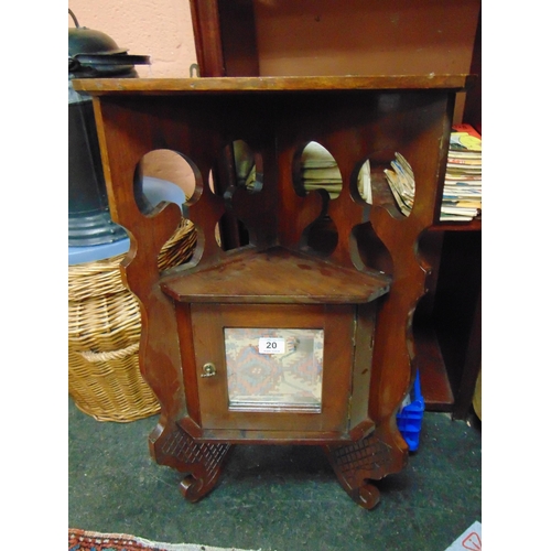 20 - Antique mahogany corner cupboard, having single mirrored door. 28 x 16