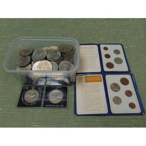 203 - Collection of crowns and a tub of coins.