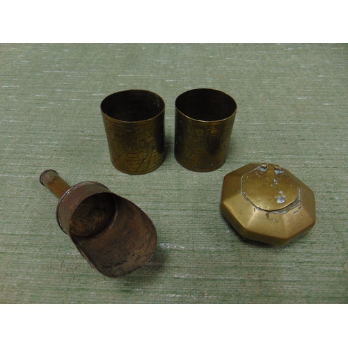 218 - Brass octagonal inkwell, miniature shovel and a pair of oriental napkin holders.