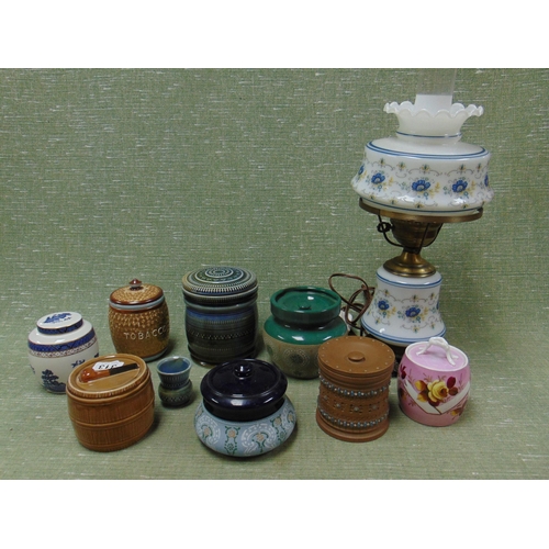 Quantity of pottery tobacco jars.