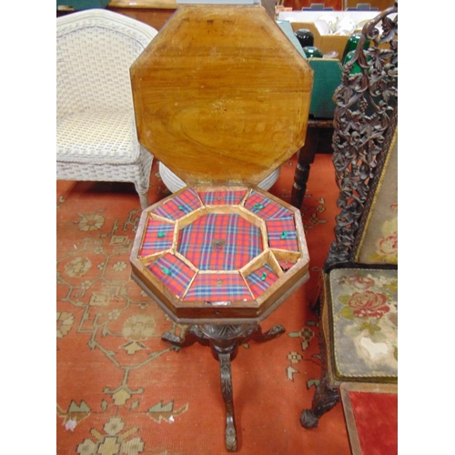 354 - Victorian walnut octagonal topped work table, fitted interior and on down swept supports. 29