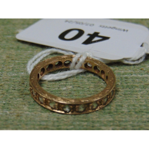 40 - Possibly gold eternity ring, size N.