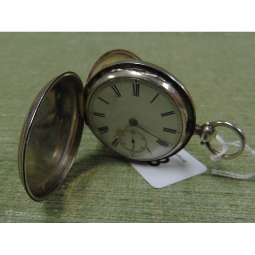 84 - Antique silver cased pocket watch, having enamel face and Roman numerals.