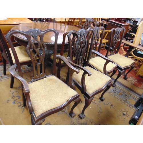 355 - Mahogany matched dining suite, comprising extending table with two extra leaves, eight Chippendale s... 