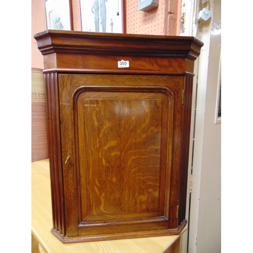 360 - An oak corner cupboard, dressing table chair and a stool. (3)