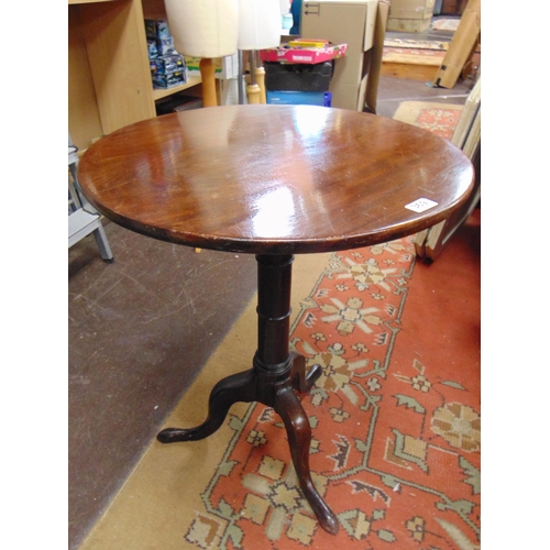 369 - Georgian mahogany tripod table, circular tilt top, gun barrel base and on down swept supports. 28