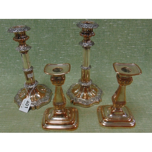 401 - Pair of antique plated candlesticks and one other pair.