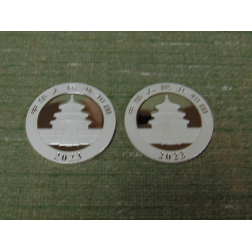 403 - Two 2023 silver Panda coins.