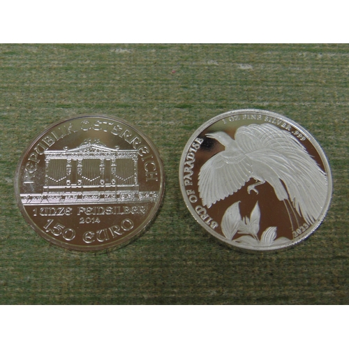 404 - Russian Philharmonic silver 2014 coin, together with a Papa New Guinea coin. (2)