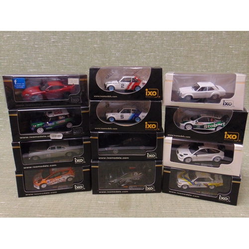 296 - Twelve boxed IXO collectable model vehicles.