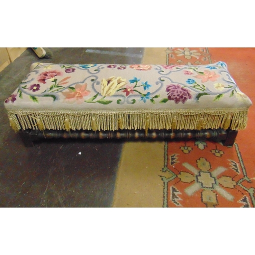 321 - Rectangular stool, having needle work top,  on turned supports and stretchers. 10 x 36 x 12