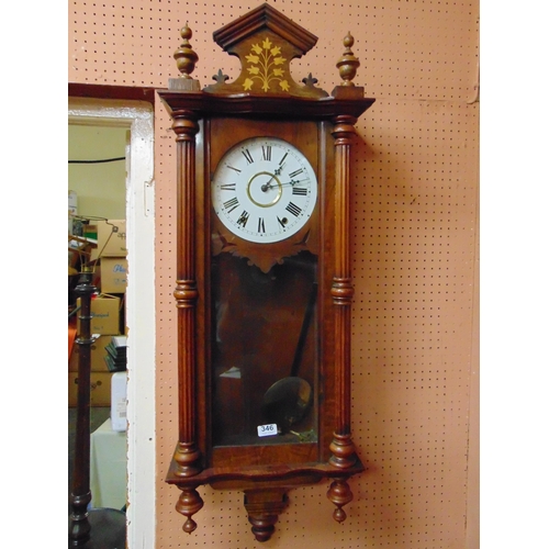 346 - Marquetry inlaid wall clock, having enamel face and Roman numerals. 44 x 15