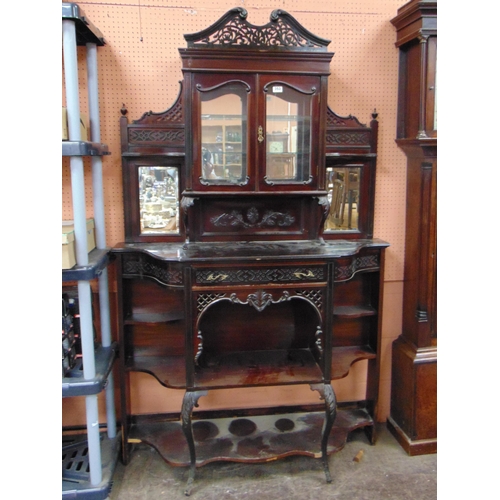 353 - Late 19th century ebony side cabinet,  segmented pediment, over pair of glazed doors flanked by mirr... 