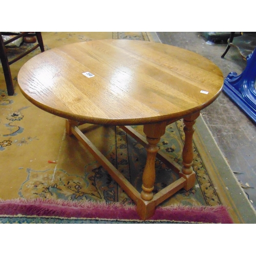 358 - Small oak drop leaf table, set on baluster turned supports.  15 x 22 x 9.5