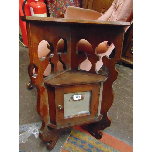 362 - Mahogany corner cupboard, having single mirrored door. 28 x 16