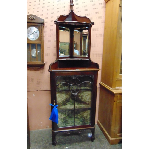 366 - Late 19th century mahogany mirror back corner cupboard, beaded glazed doors  enclosing a plush shelf... 