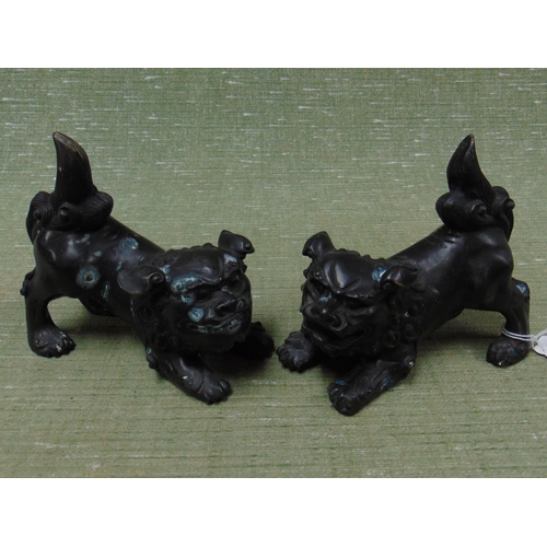 49 - Pair of bronze Oriental dogs of Foo figures.