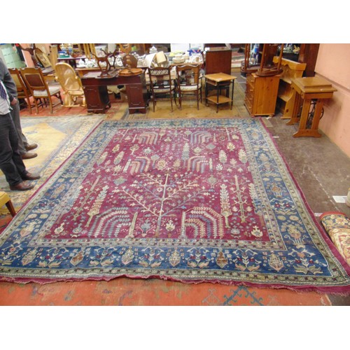 350 - Persian purple and blue ground rug, having geometric pattern,  143 x 109