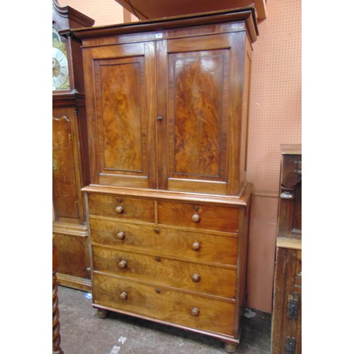 369 - Antique mahogany press cupboard, ogive cornice above pair of doors enclosing three linen slides, ove... 