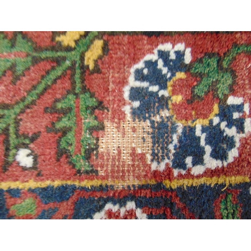 1 - Persian red and blue ground rug, having geometric floral pattern. 120 x 92