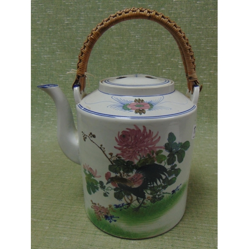 173 - Oriental tea pot, having wicker handle, traditional decoration. 10