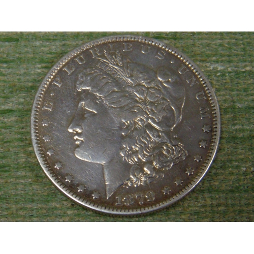 44 - Silver USA 1879 Morgan dollar.