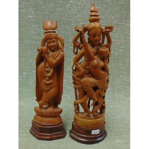 527 - Pair of Balinese carved figures.