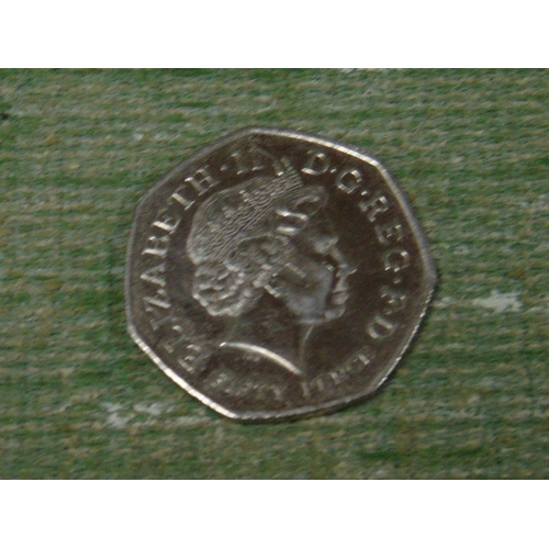 56 - Kew Gardens commemorative 50p coin.