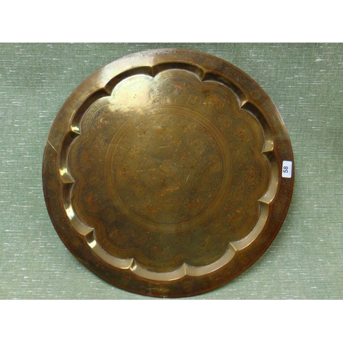 58 - Engraved Eastern brass tray, 23