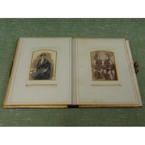 67 - Antique photograph album and contents.