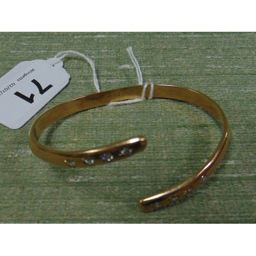 71 - 9ct gold bangle, of shaped design, 26.6 gms.