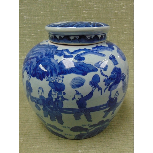 10 - An Oriental blue and white ginger jar and cover, decorated with classical figures and character mark... 