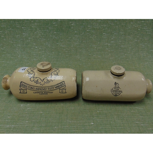 15 - Two Doulton stoneware foot warmers.