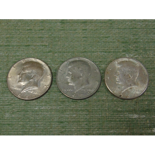 183 - Three silver USA Kennedy half dollars, 1964, 1968 & 1974.