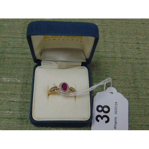 38 - 9ct gold ring, set with ruby stone surrounded by diamond chips, size Q.