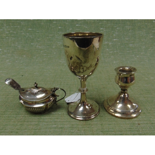 458 - Silver goblet, squat candle stick and a mustard pot.