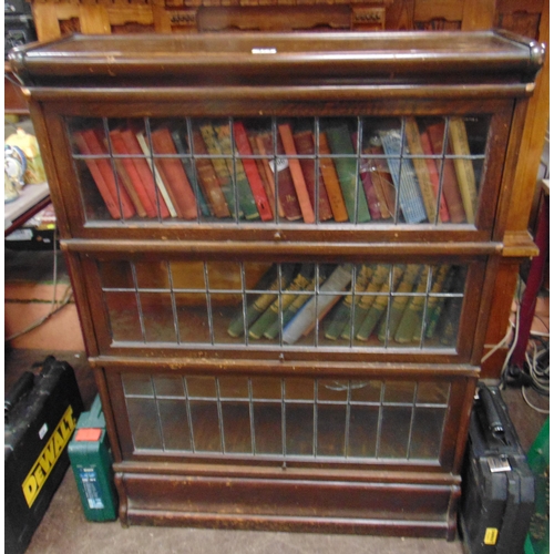 473 - Globe Wernick three tier bookcase - faults to glass in one section.